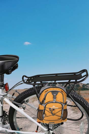 A backpack Attached to the bike rack